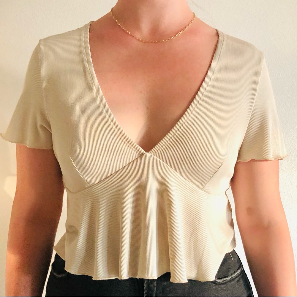 Cream peplum tee